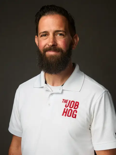 John Hootsell, bearded, in a white Job Hog polo